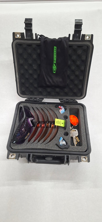 Methow 6 XHD fair-eye kit in a black hard case; keys and hearing protection illustrate storage and are not included