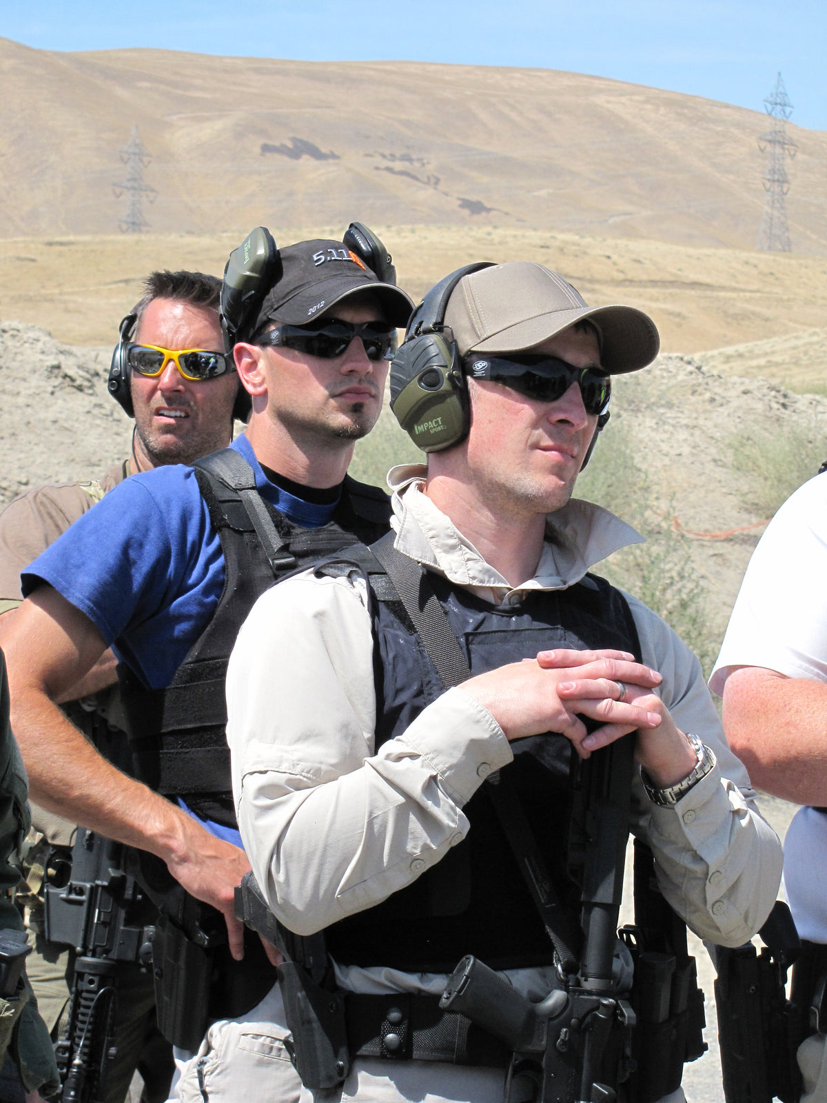 A group of range participants wearing SSP PRO glasses.